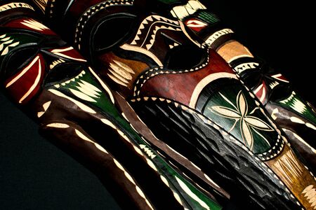 Low Key of hand made wooden mask from Africa, Swasilandの写真素材