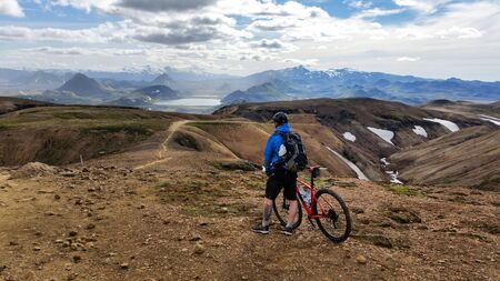 mountain biker cruising through iceland in Europeの写真素材