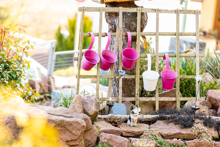 Arrangement of different buckets in garden for decortion purposeの写真素材
