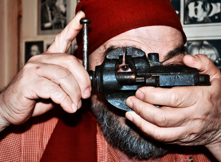 Ingenious photographer in front of his portrait portfolioの写真素材