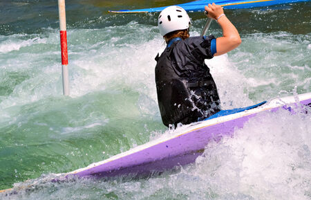 Kayak race on a river flowの写真素材