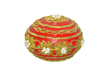 Decorated red easter egg isolated on white backgroundの写真素材