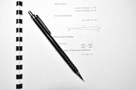 Pencil and mathematical book on some kind of geometryの写真素材