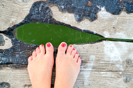 View from above on the bare feet and toesの写真素材