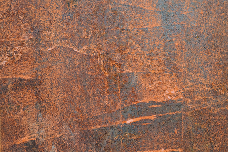 Closeup of rusty metal panel as background with detailed structureの写真素材
