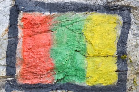 Lithuanian flag painted on the rock with sprayの写真素材