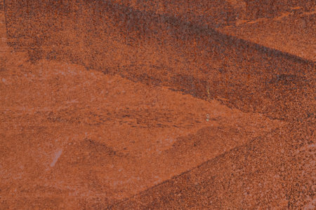 Closeup of rusty metal panel as background with detailed structure