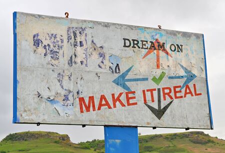 Text message about personal ambitions written on a white billboardの写真素材