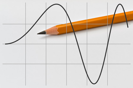 Graph of a part of sine function and yellow pencilの写真素材