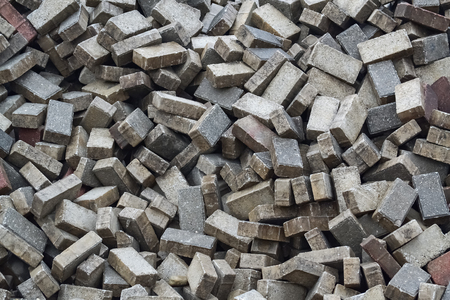 Closeup of a pile of unsorted paving blocks during the reconstructionの写真素材