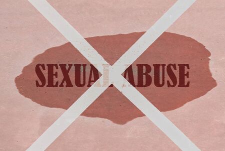 Strikethrough text Sexual Abuse written on pink backgroundの写真素材