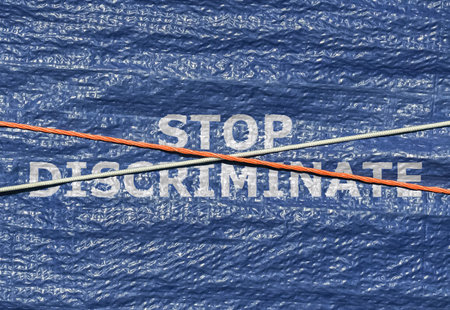 Text Stop Discriminate and rope over it written on blue background