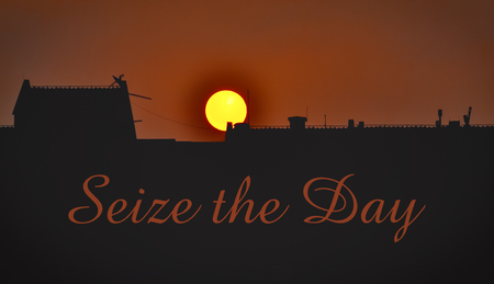 Golden sunrise over the city and text Seize The Dayの写真素材