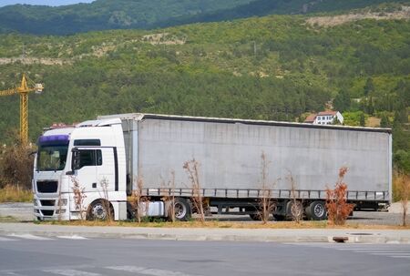 Big truck on the parking lot near the construction siteの写真素材