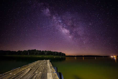 Milky Way and a boat dockの写真素材