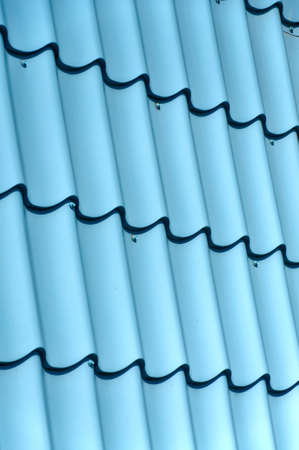 Vertical ridged blue painted metal wall texture の写真素材