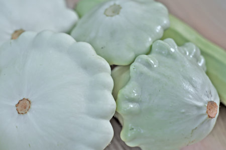 Fresh Bush pumpkins on a table, closeup の写真素材