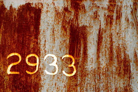 Rusty Texture with digits drawn with paintの写真素材