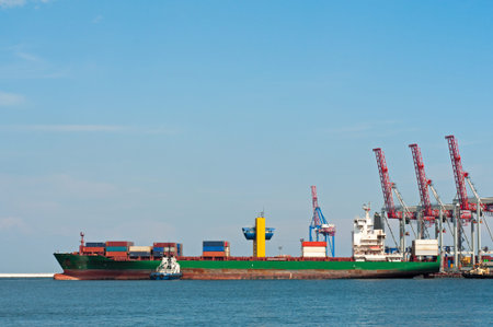Cargo Ship mooring into the harbour.