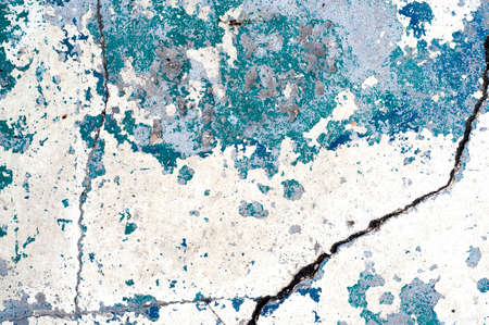 Distress Worn Cracked Plaster with blue And White Paint.の写真素材