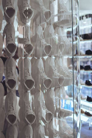 Tube filled with white sneakers at Soho, New York City, USAのeditorial素材