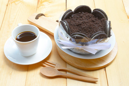 Creamy cheesecake with chocolate cookies and cream biscuits.の写真素材