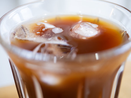 americano coffee beverage black cold drink ice glass cup fresh caffeine cafe espresso and water refreshment morning breakfast food relax lifestyle brown background selected focusの写真素材