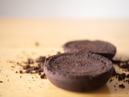 coffee grounds after bean extraction espresso machine perfect cookie powder pile brown roasted dark black drink caffeine food fresh ingredient beverage on wooden table background selected focusの写真素材