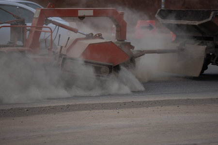 The street sweeper machine working. Street cleaning machine. Industrial road sweeper