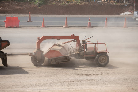 The street sweeper machine working. Street cleaning machine. Industrial road sweeperの写真素材