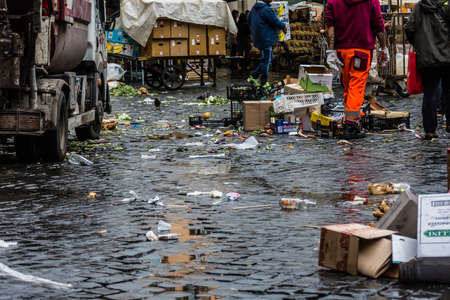 Garbage on the Campo Fiori in Rome after a normal market day. City sanitation cleans the square.のeditorial素材