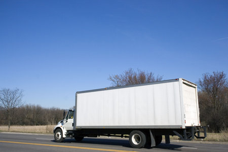 White  Truck driving the road