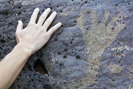 Hands in Petroglyph National Monument, New Mexico.の写真素材