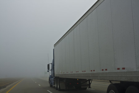 Foggy Day - driving semi-truck.の写真素材