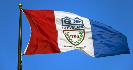 Cleveland flag against blue skyの写真素材