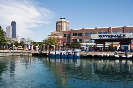 Navy Pier seen from the boat on Lake Michigan. Seen during the summer morning. Navy Pier is a 3300 feet pier located in downtown Chicago. Hancock Tower on the left.のeditorial素材