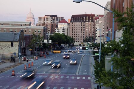 Madison, Wisconsin, USA Traffic on University Avenue in downtown of Madison. Dome of the State Capitol Building far left. August 17, 2011のeditorial素材