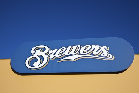 Brewers sign in front of Miller Park in Milwaukee against blue sky. Milwaukee Brewers is a professional baseball team playing in Central Division of Major League Baseball's National League. Brewers play the games at Miller Park.のeditorial素材