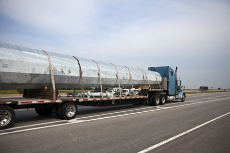 Transporting cell tower - part of the tower loaded on the semi truckの写真素材