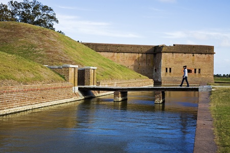 Tourist walking to Fort Pulaski, Georgiaのeditorial素材