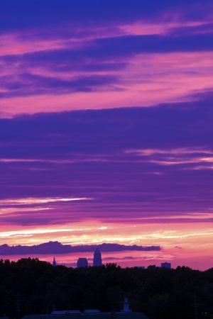 Sky on fire in Cleveland - distant view of downtown of the cityの写真素材