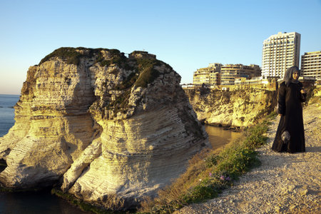 Beirut, Lebanon - February 05, 2012 Young Lebanese woman visitin the Piegeon Rocks area. Seen during...