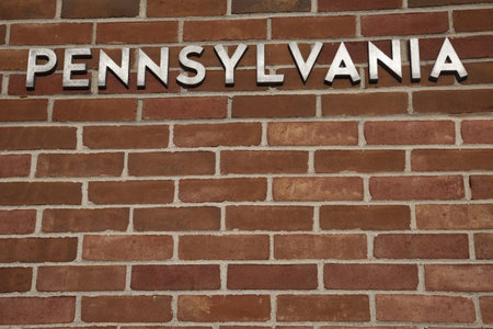 Pennsylvania sign on the brick wall - welcome center building.
