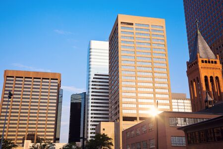 Denver in the morning with the rising sun reflecting in the buildingの写真素材