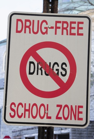 Drug Free School Zone sign in front of the school.の写真素材