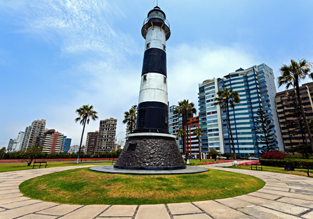 Miraflores Lighthouse with palm tree - Miraflores, Lima, Peruの写真素材