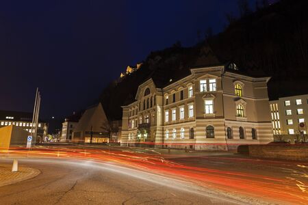 Parliament building in Vaduz during the evening traffic. Vaduz, Liechtenstein.のeditorial素材