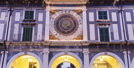 Old clock on Piazza della Loggia in Brescia. Brescia, Lombardy, Italyの写真素材