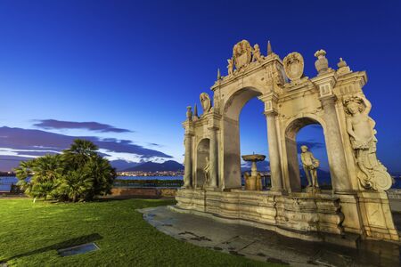 Immacolata Fountain in Naples. Vesuvius in the background. Naples, Campania, Italyの写真素材
