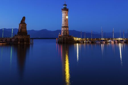 Lindau Lighthouse at sunrise. Lindau, Bavaria, Germany.の写真素材